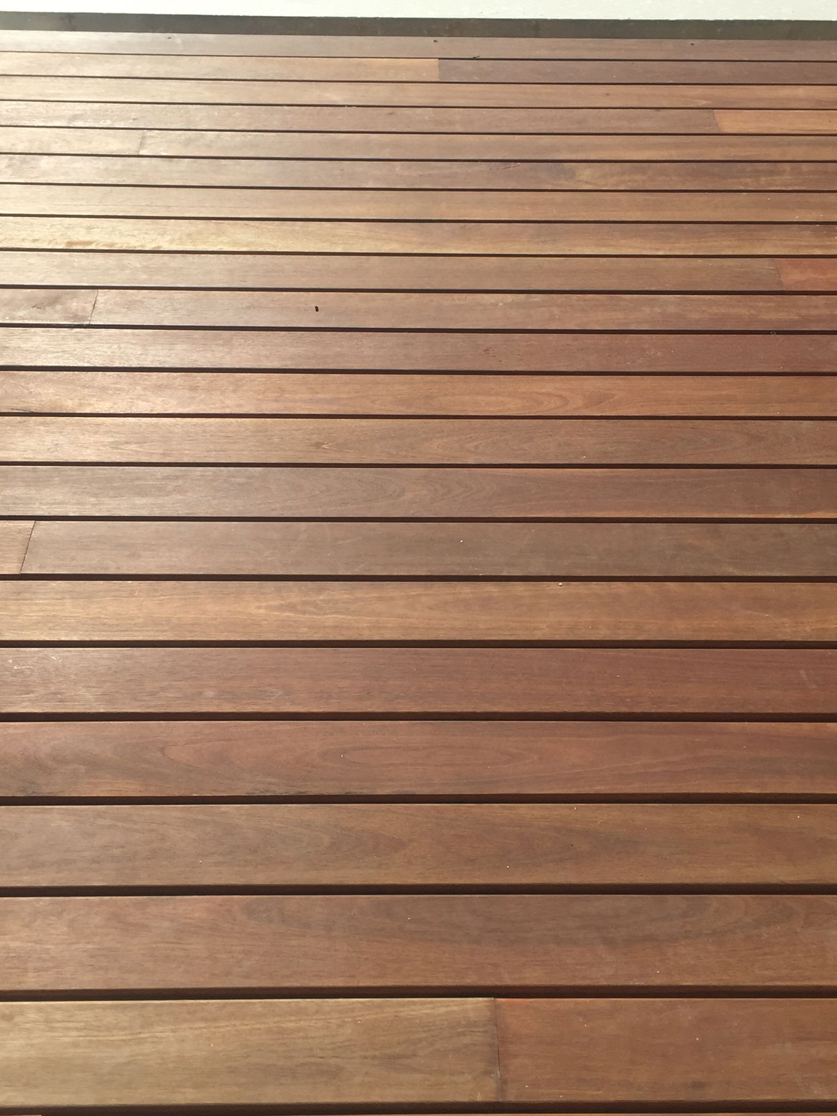 Close up of a perfectly lined part of a timber deck